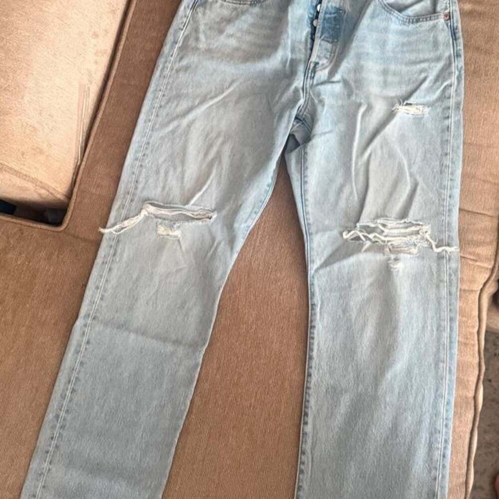 Levi's 501 Button Fly Light Wash Distressed Jeans